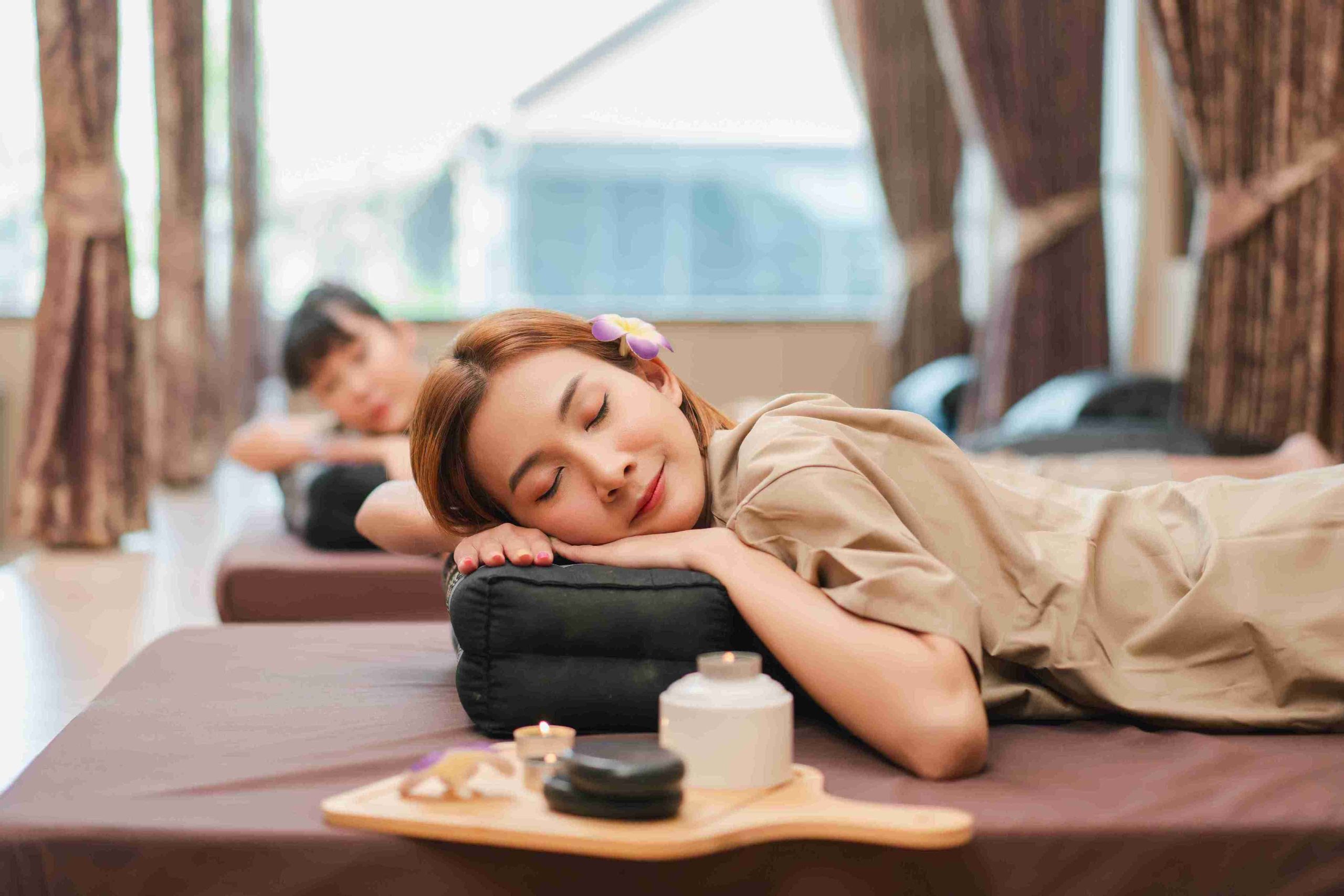 Woman receiving massage and relaxing.